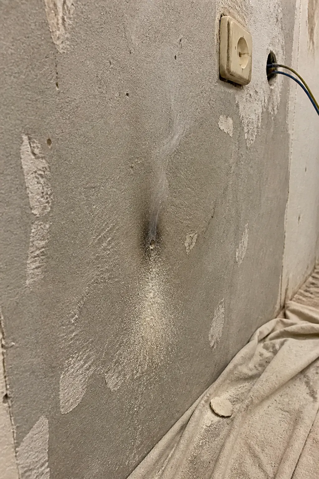 Cheap impact drill failing on a concrete wall