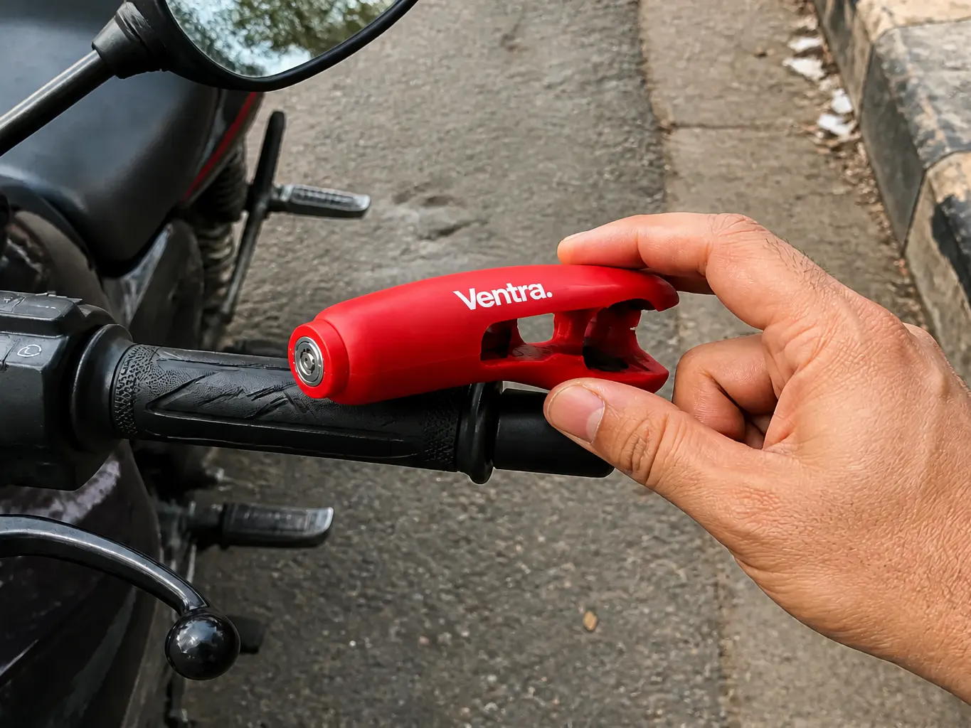 Rider squeezing the front brake lever toward the grip