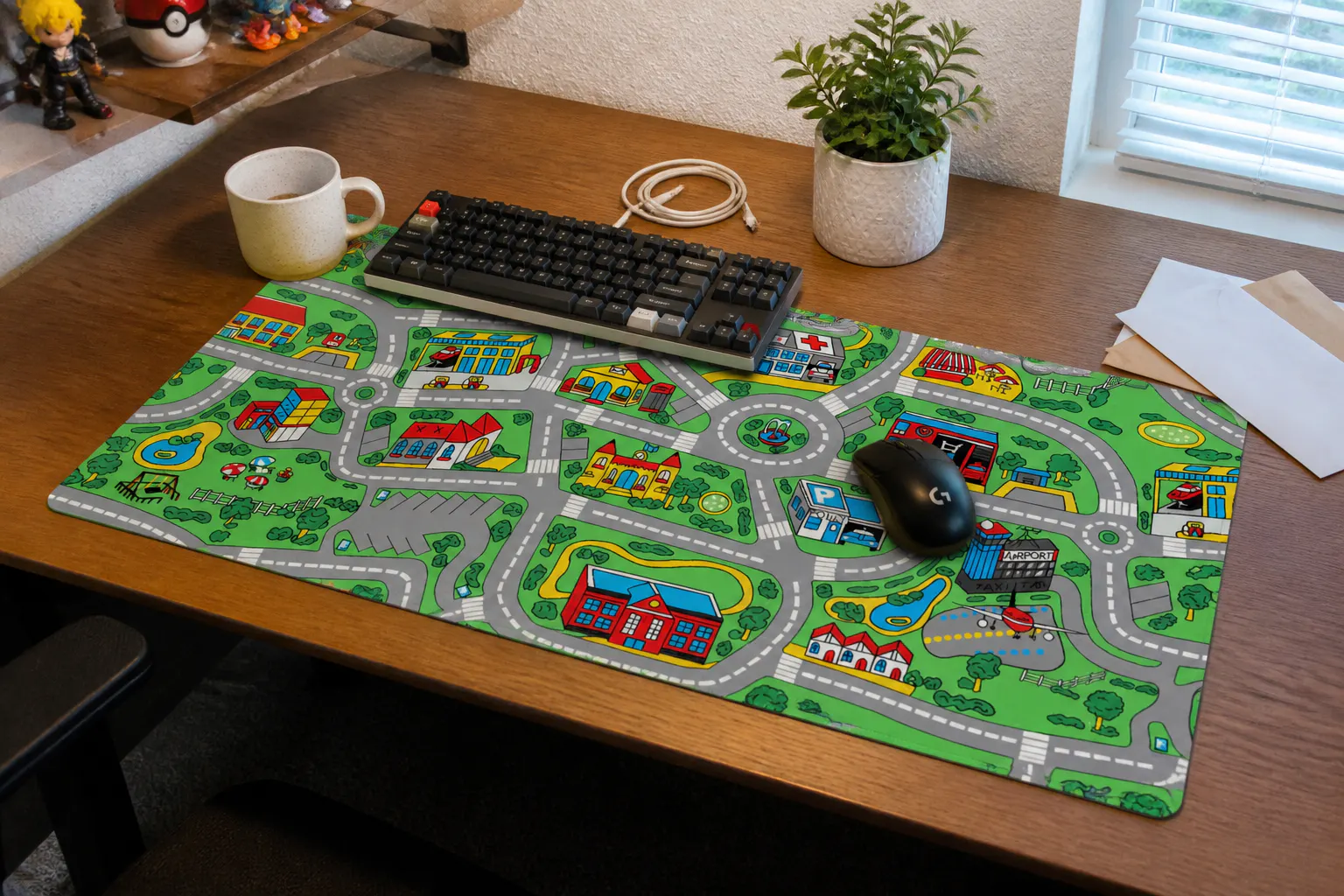 Full desk setup anchored by the road-rug mat with keyboard and mouse on top