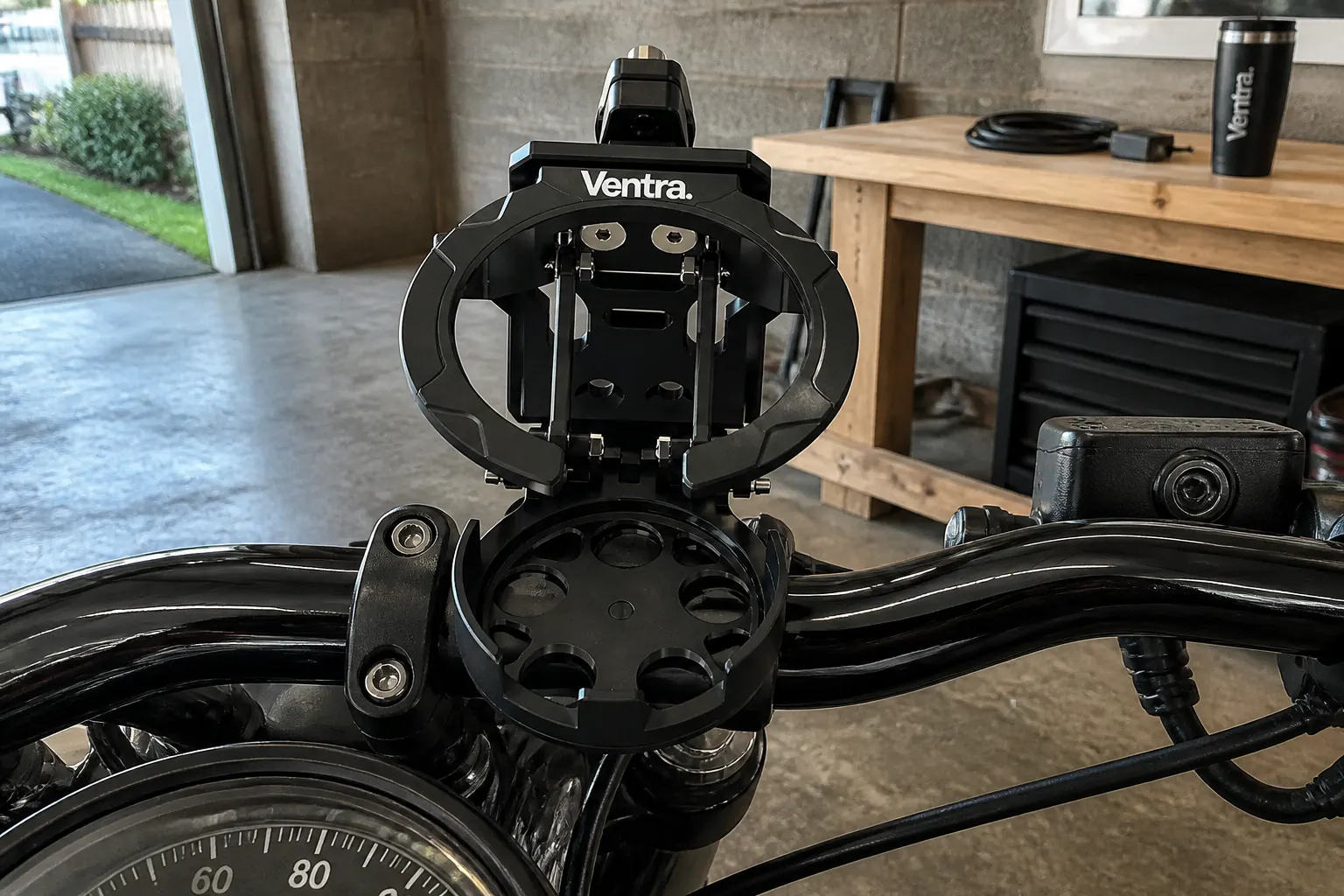 Machined aluminum cup holder locked to a motorcycle handlebar