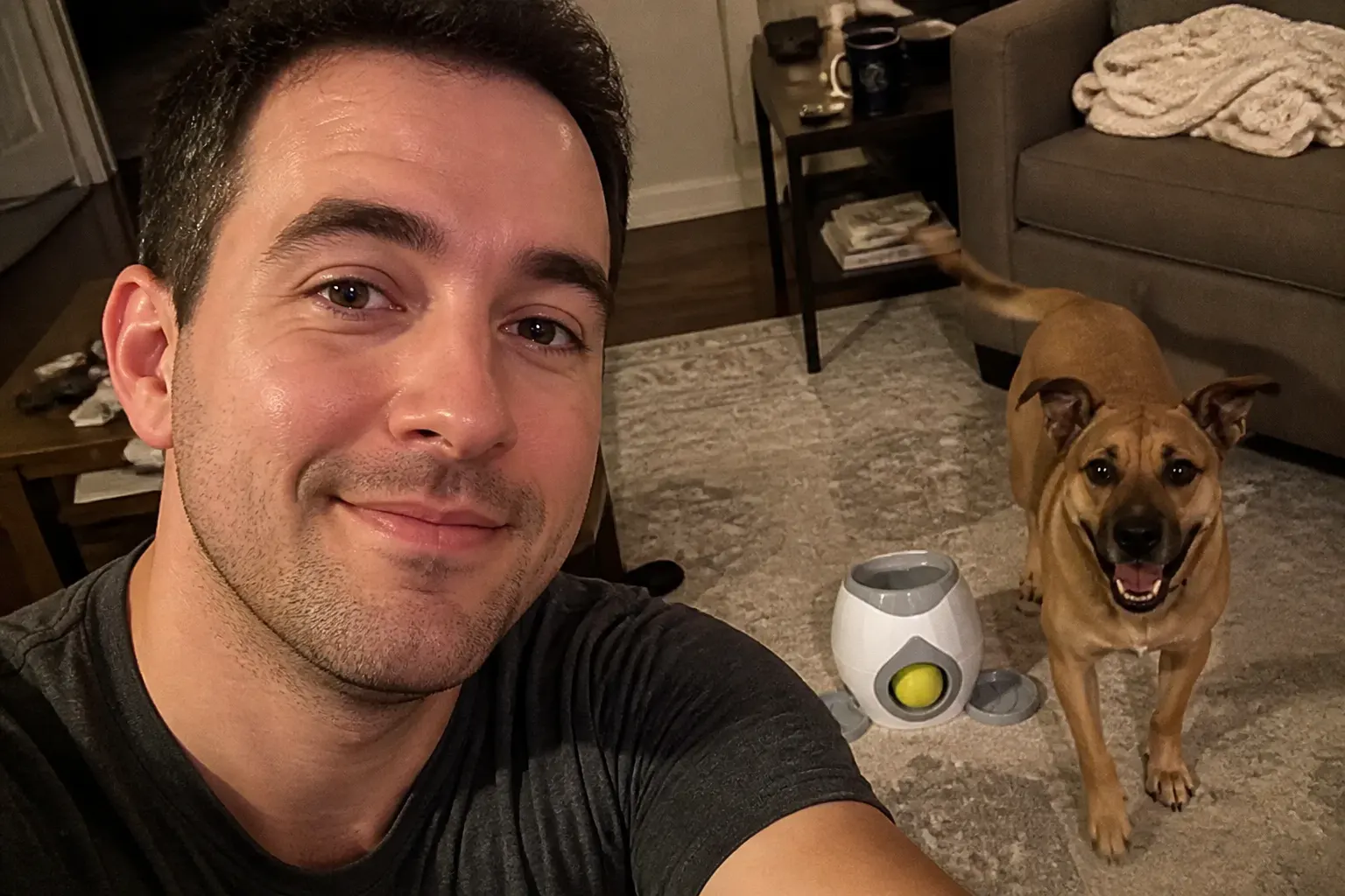 Labrador dropping ball into the FetchBot