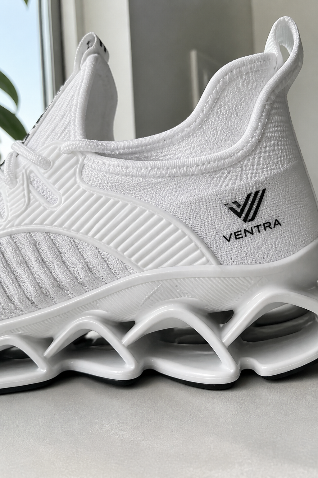 Close-up of Ventra cushioned blade sole and mesh upper