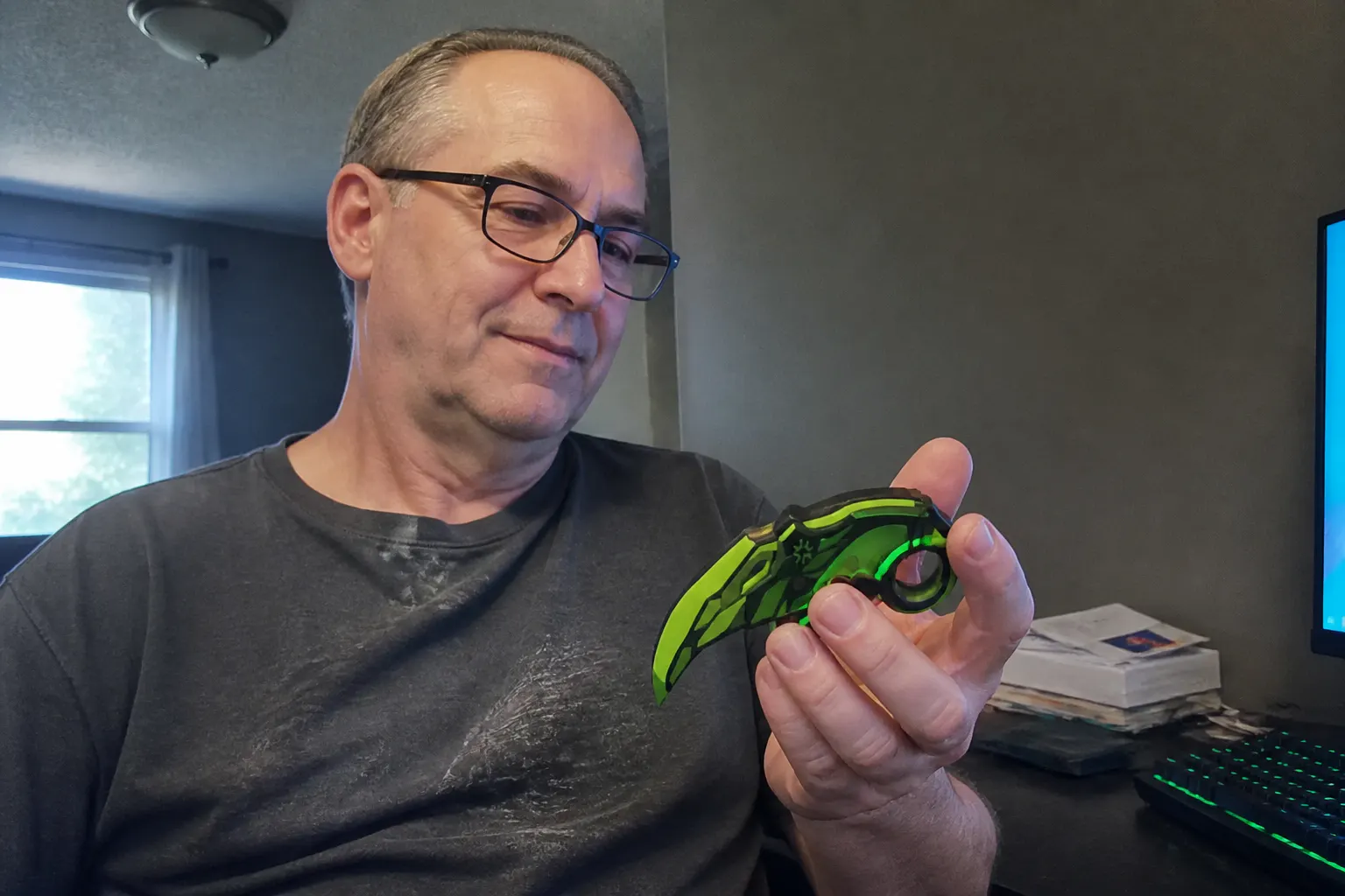 Customer holding the glowing GlowKatana