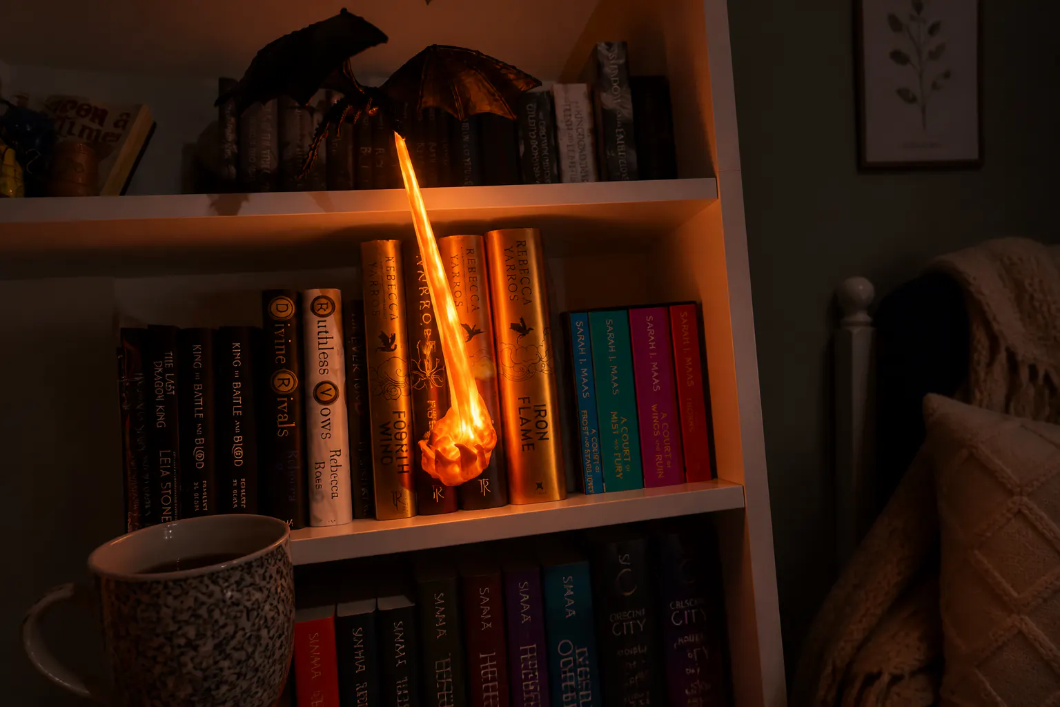 The lit dragon guardian glowing as the focal point of a cozy dim reading nook