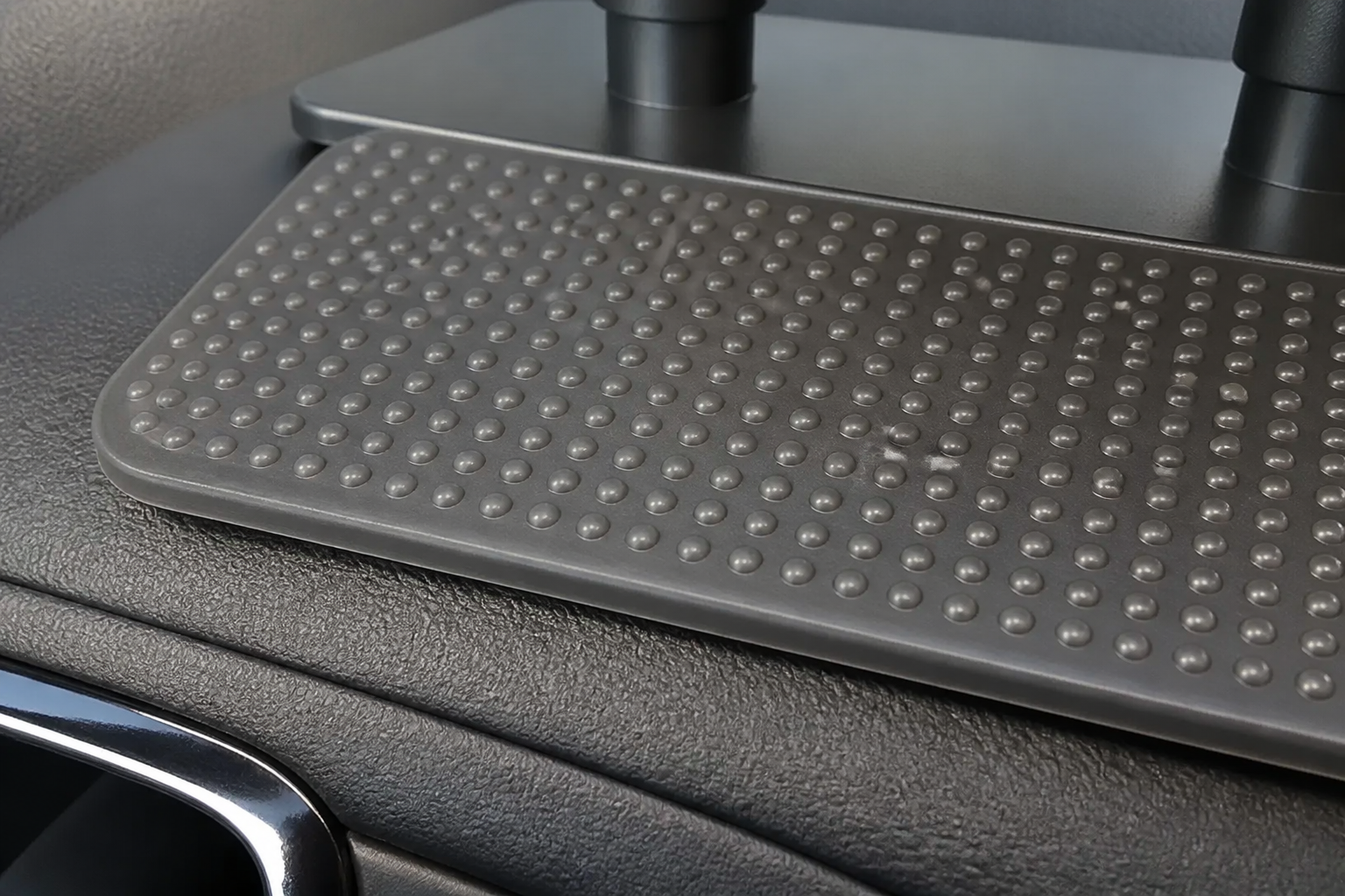 Non-slip textured base of the Ventra armrest