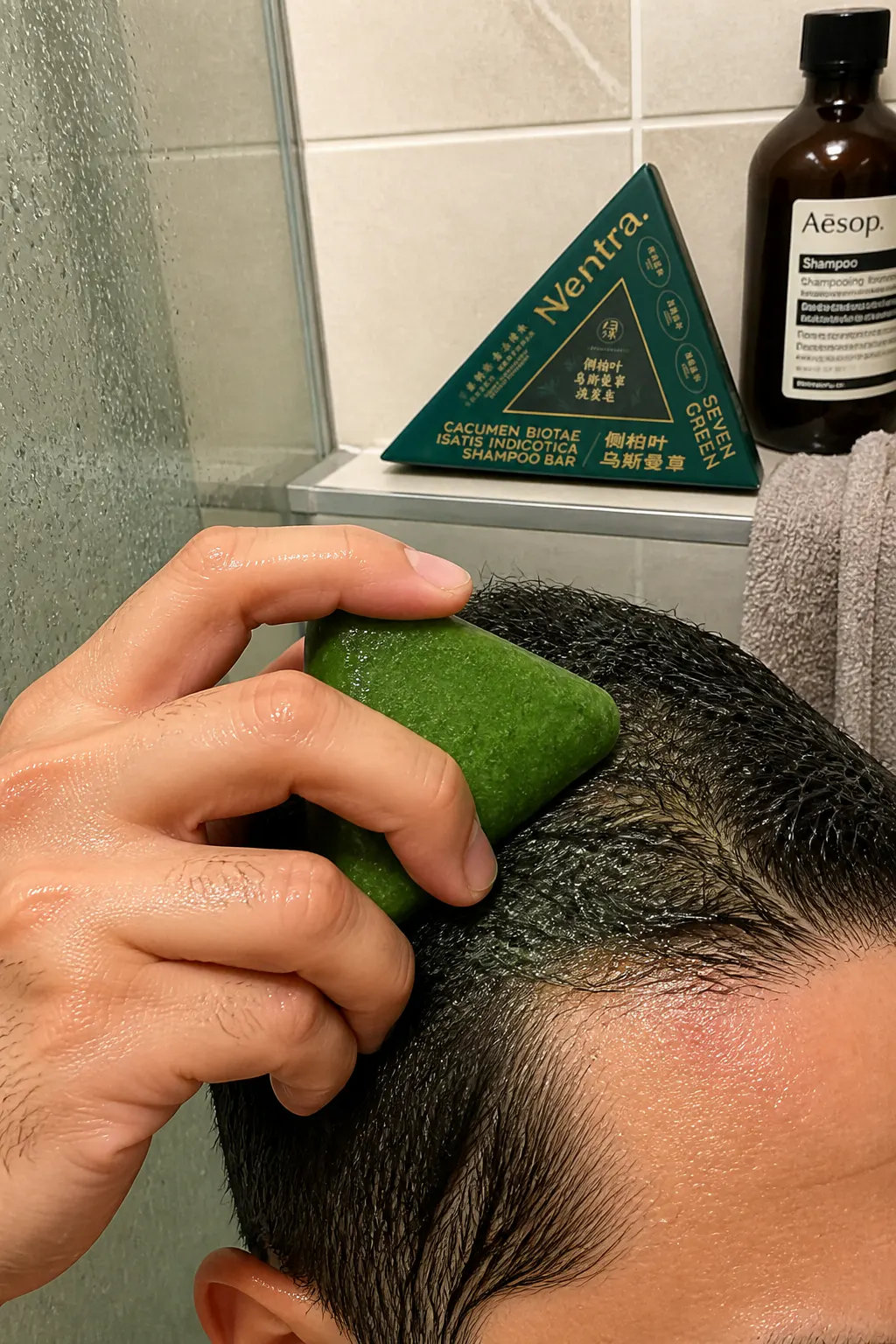 Ventra herbal scalp therapy bar close up with green botanical texture