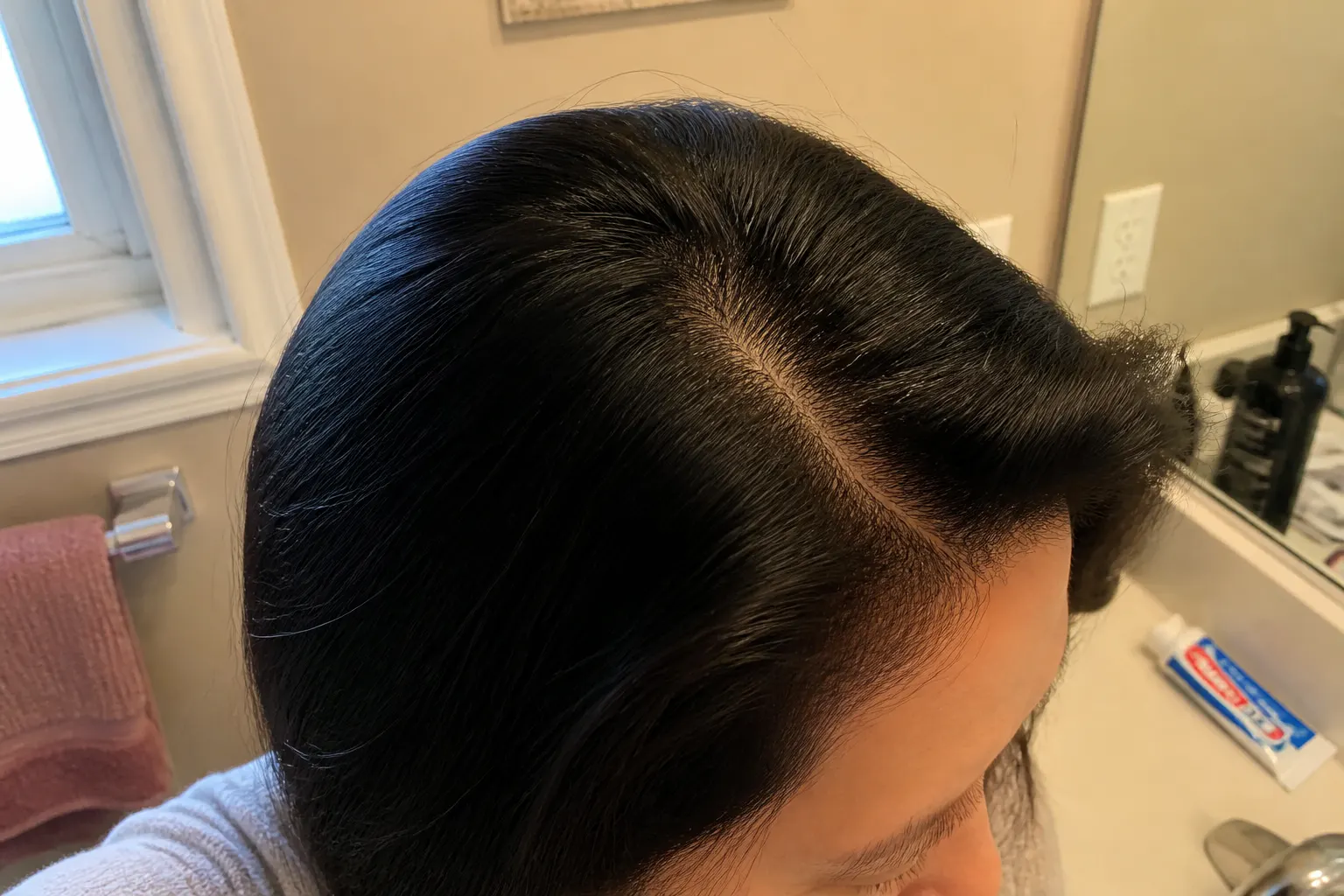 Shade swatches on grey and dark hair bases