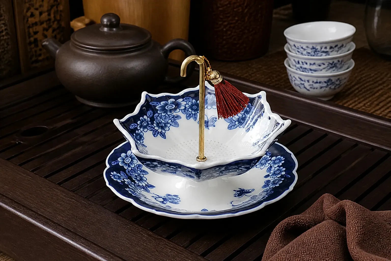 Matching porcelain drip saucer for the umbrella tea strainer