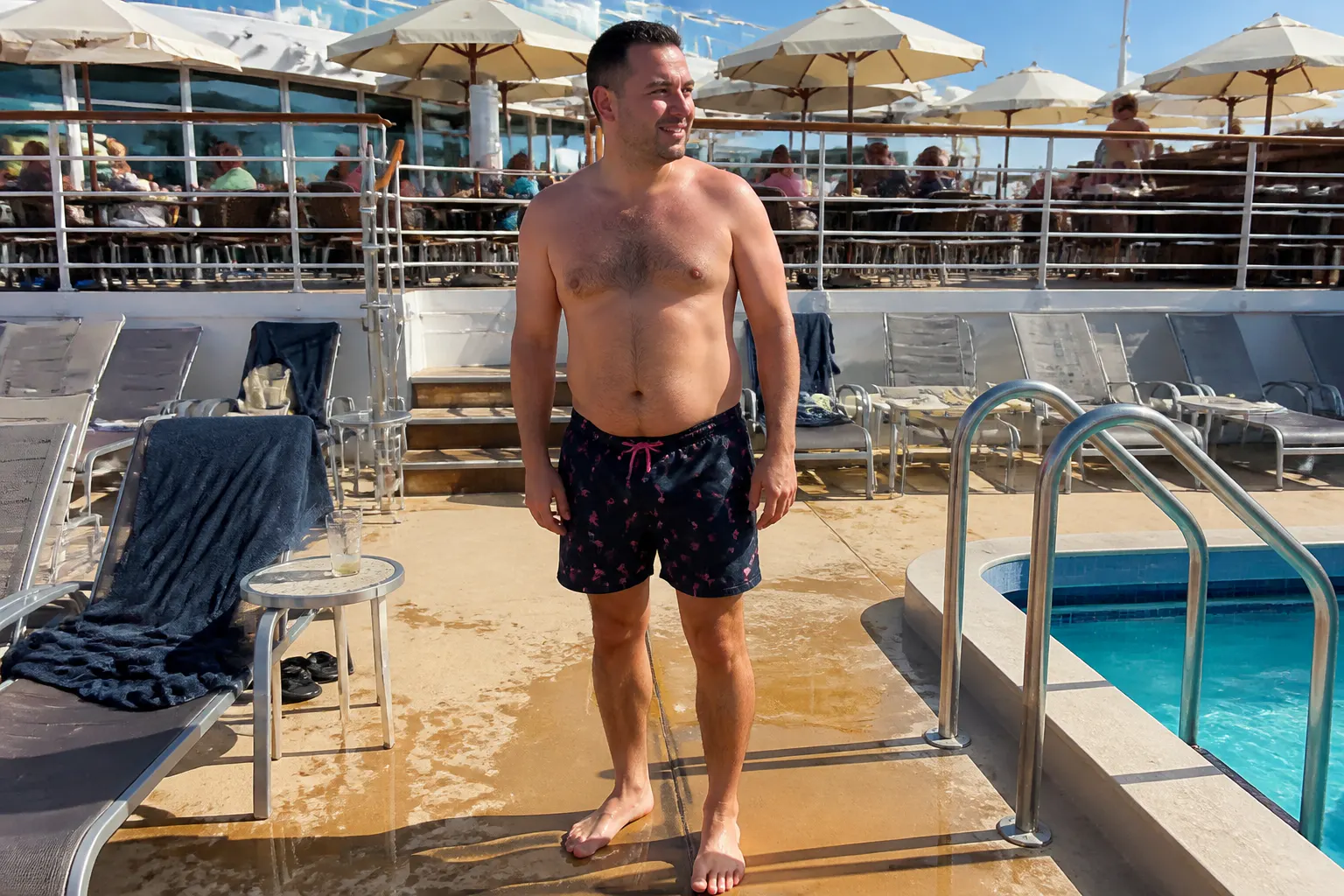 Man in Ventra trunks at the pool and walking around town