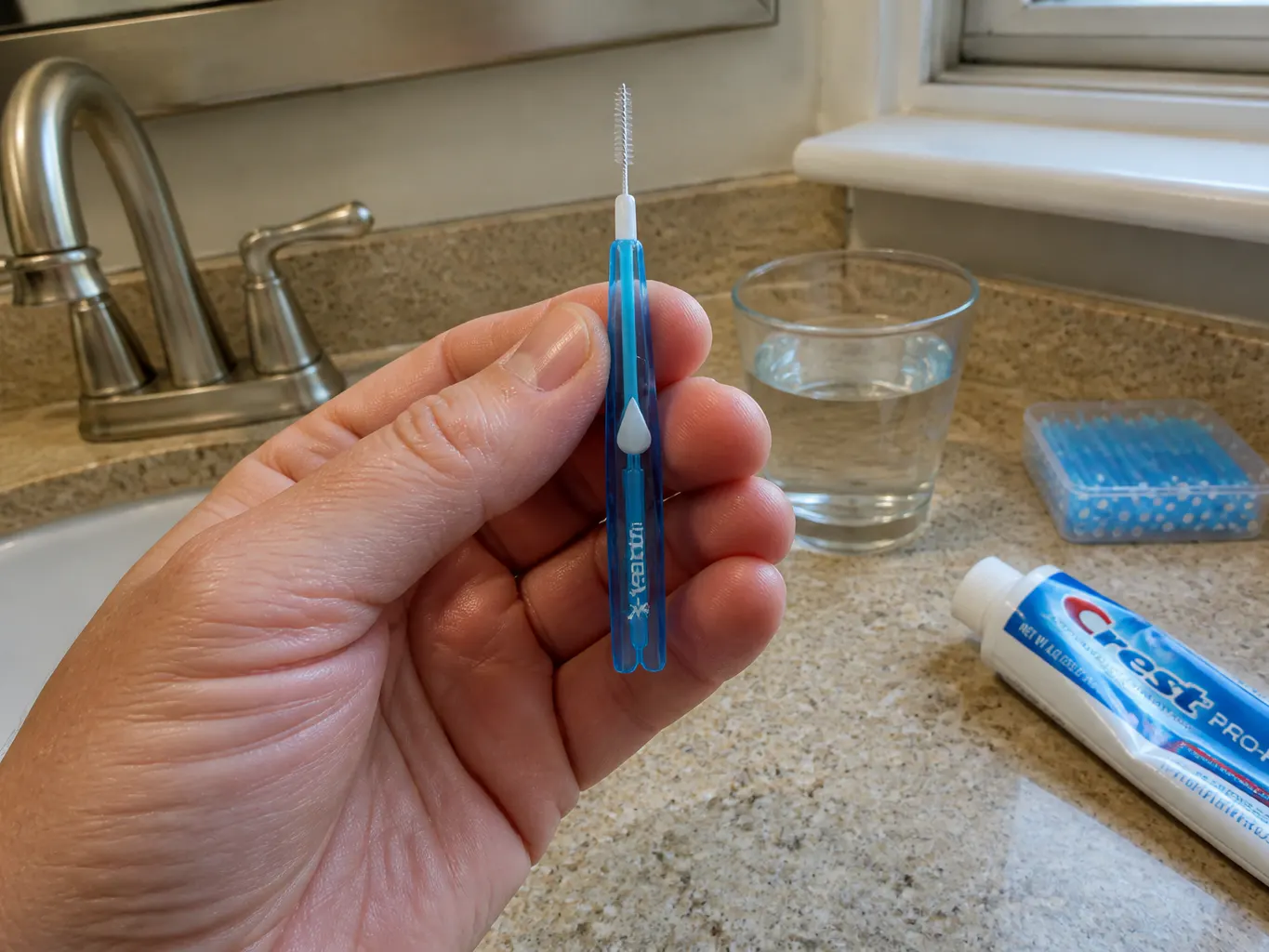 Macro of the color-coded interdental brush size range from 0.6 to 1.5mm