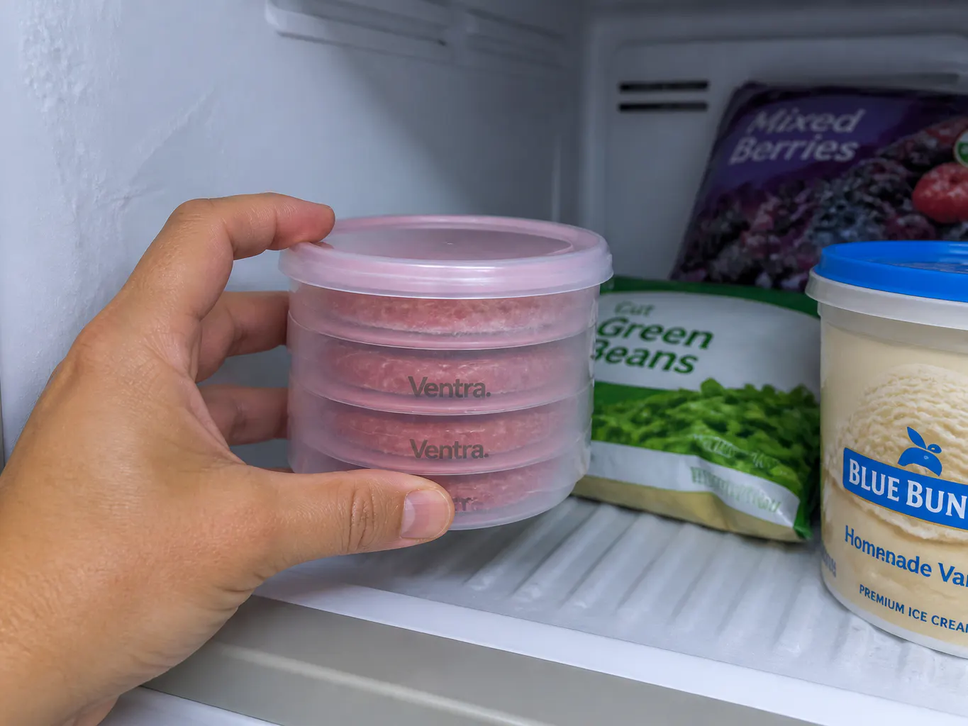 Sealed storage cylinder sliding into a freezer drawer
