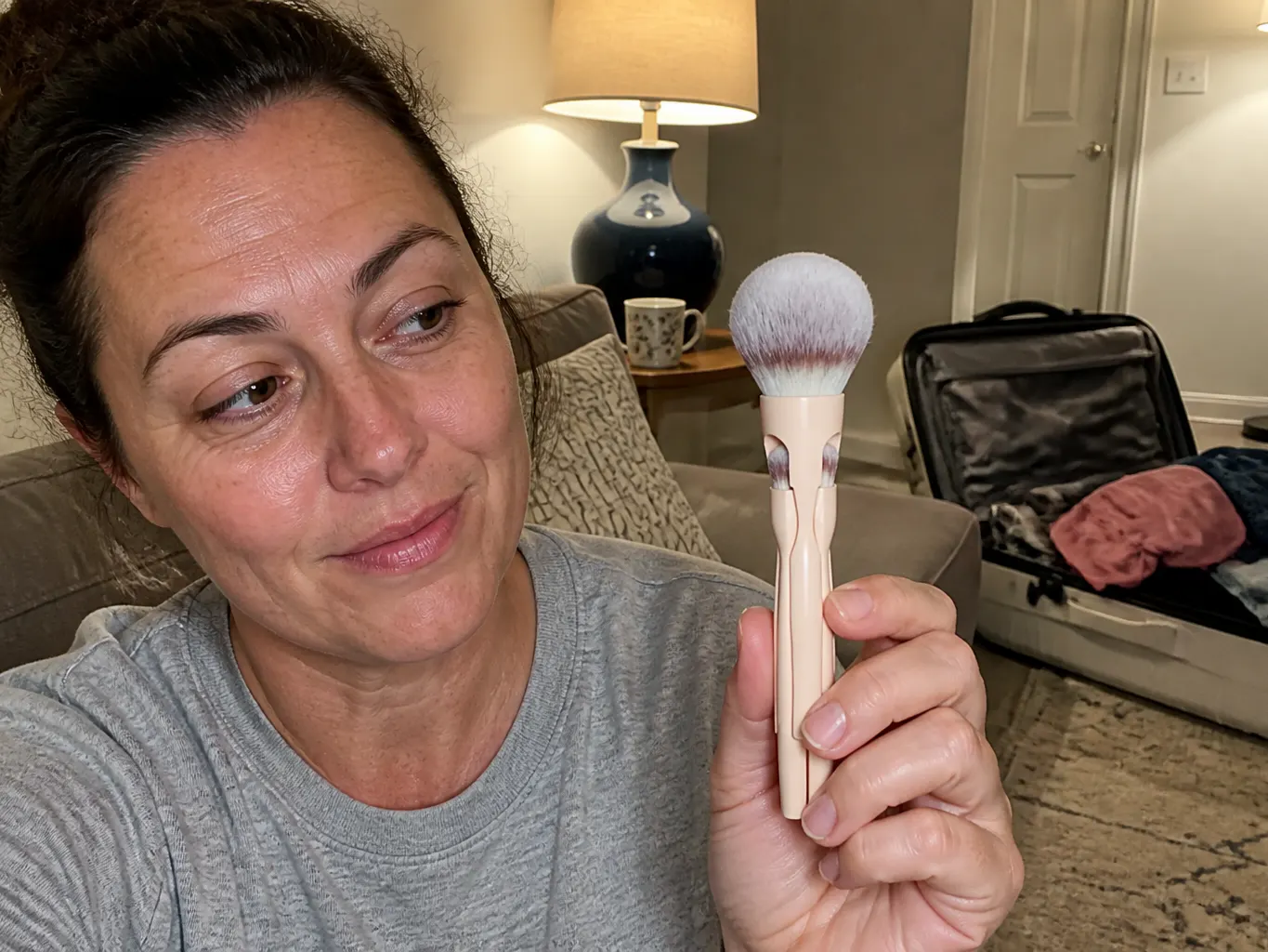 Closed brush sitting on a hotel bathroom counter
