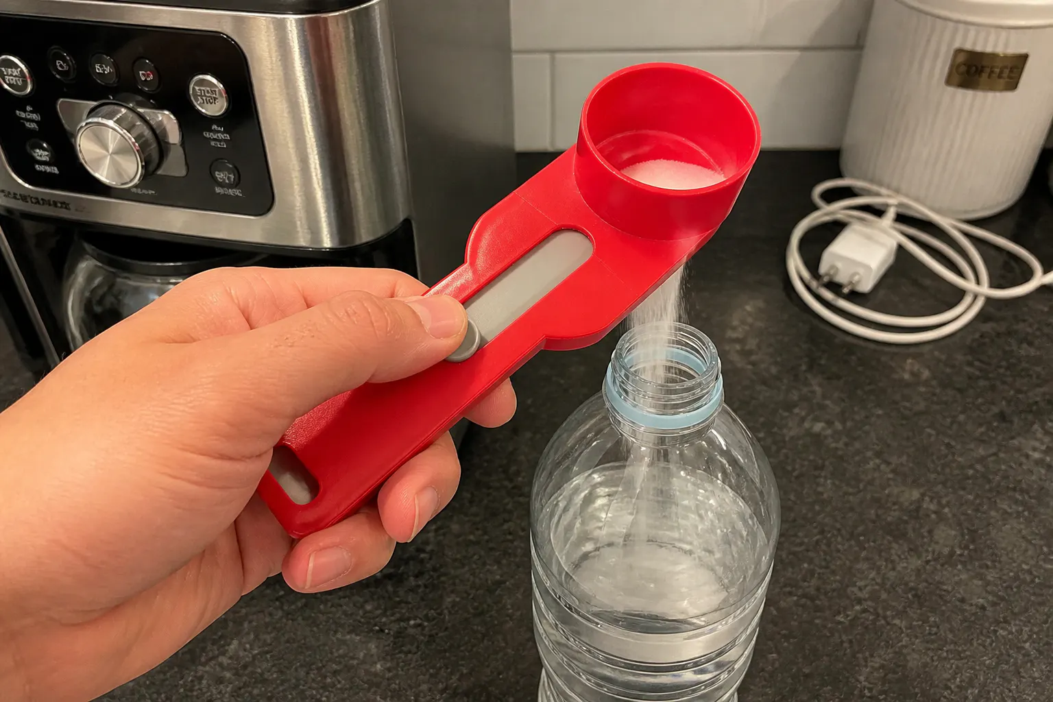 Line the funnel tip over the neck