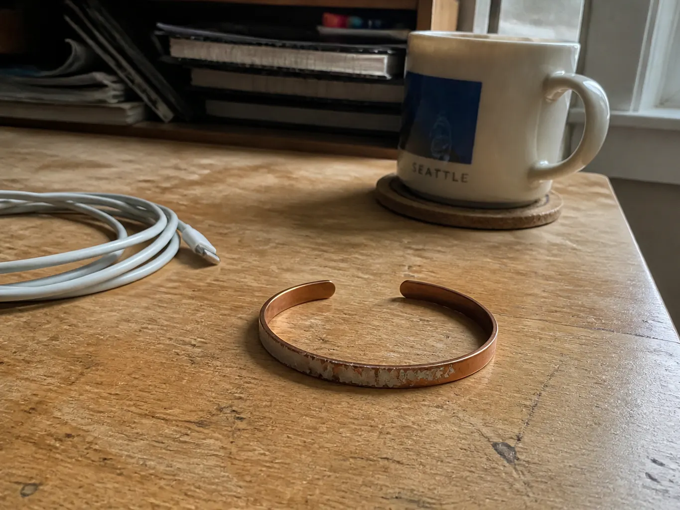 Chipped, patchy plated copper-tone bracelet