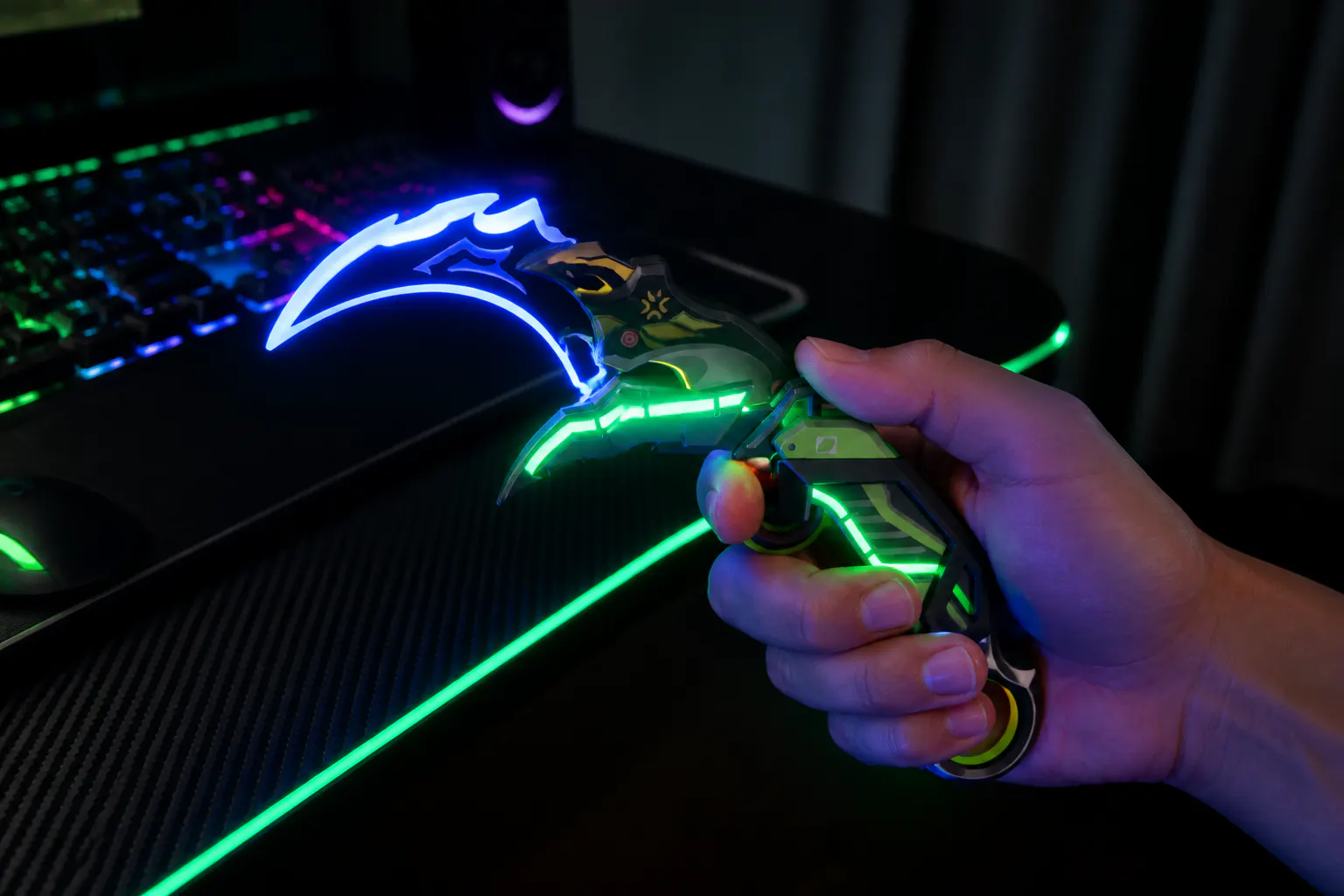 Glowing claw spun in a dark room, arc traced for the camera