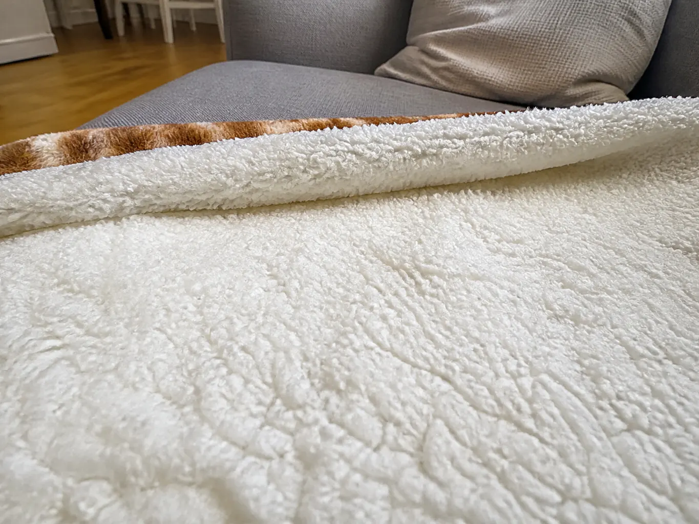 Macro close-up of nubby high-loft cream sherpa pile