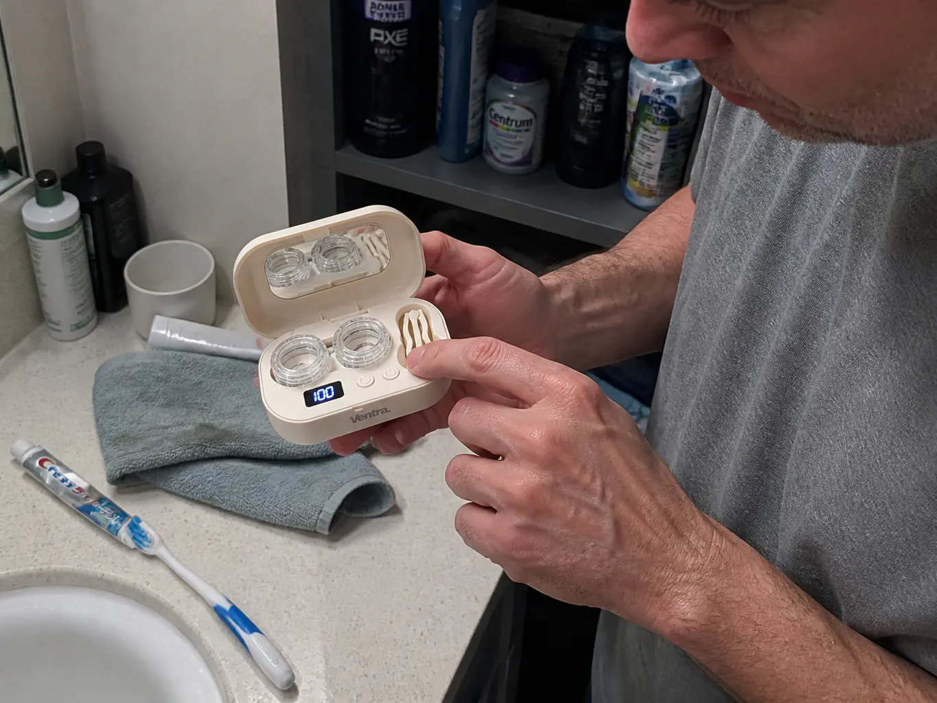 Ventra lens cleaner charging via USB-C on a desk