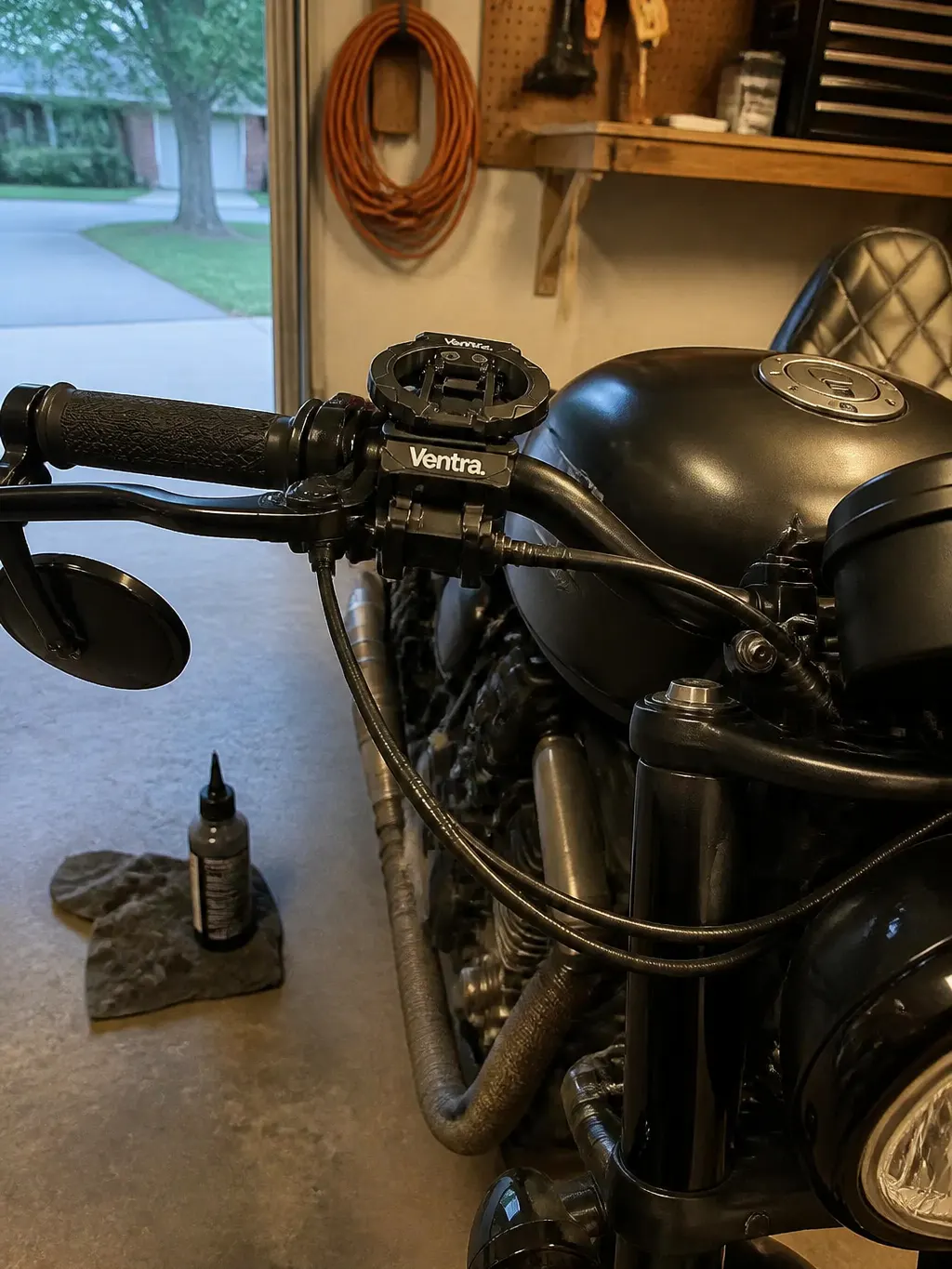 Folded cup holder against a motorcycle handlebar
