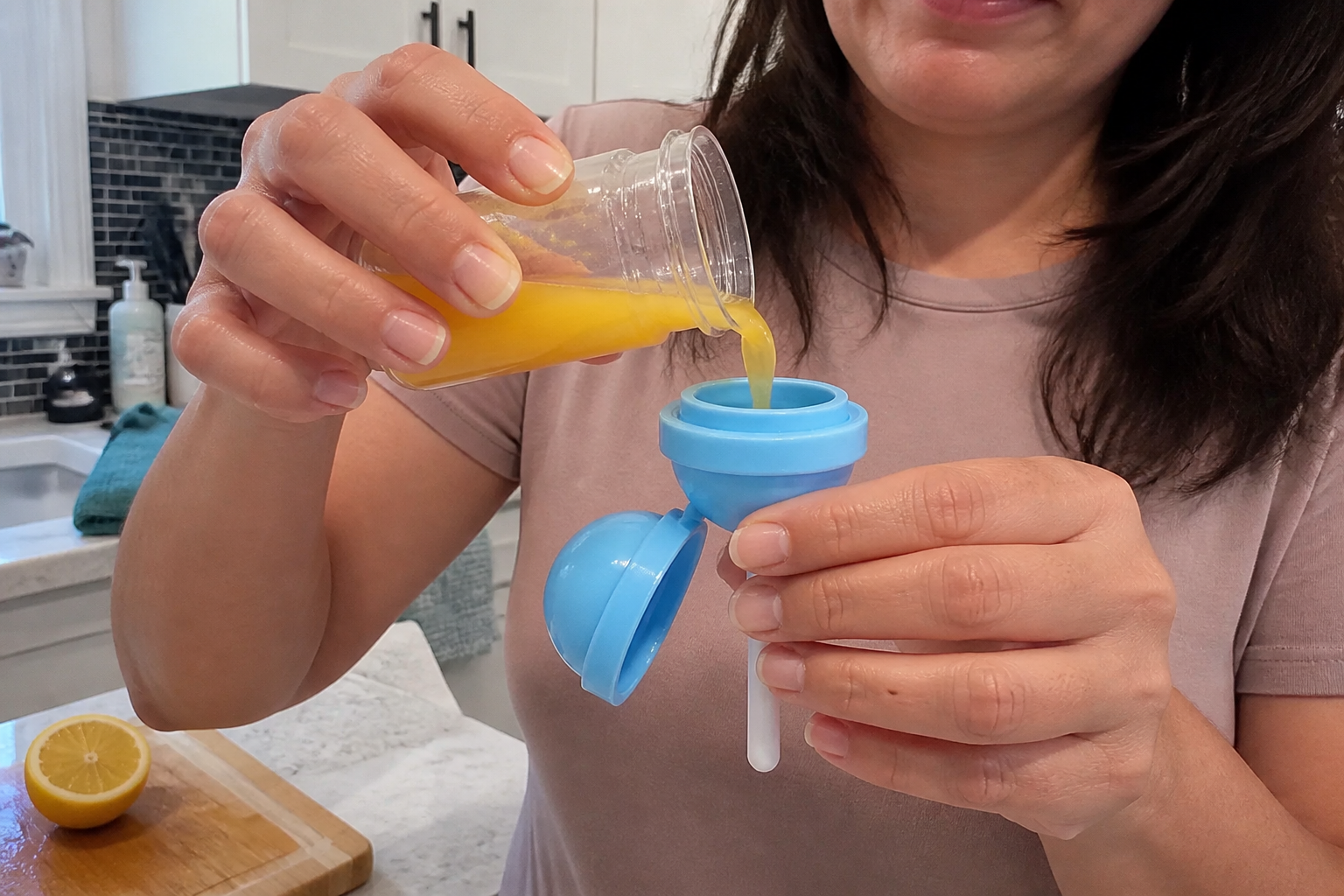A child enjoying a homemade planet popsicle
