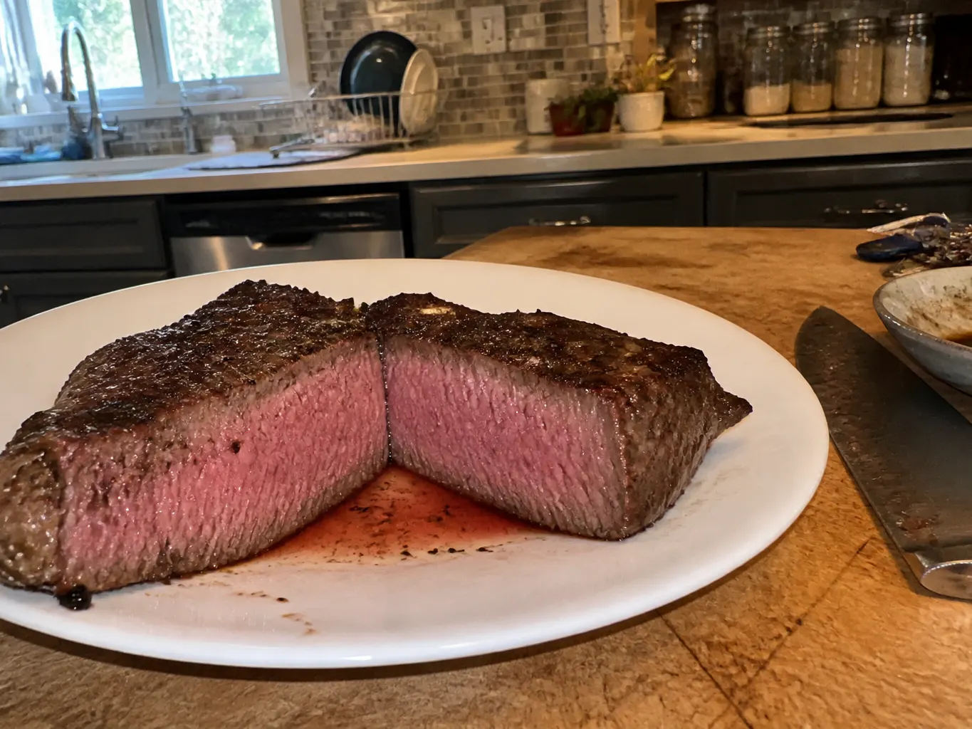 Treated steak sliced open showing marinade inside the cut