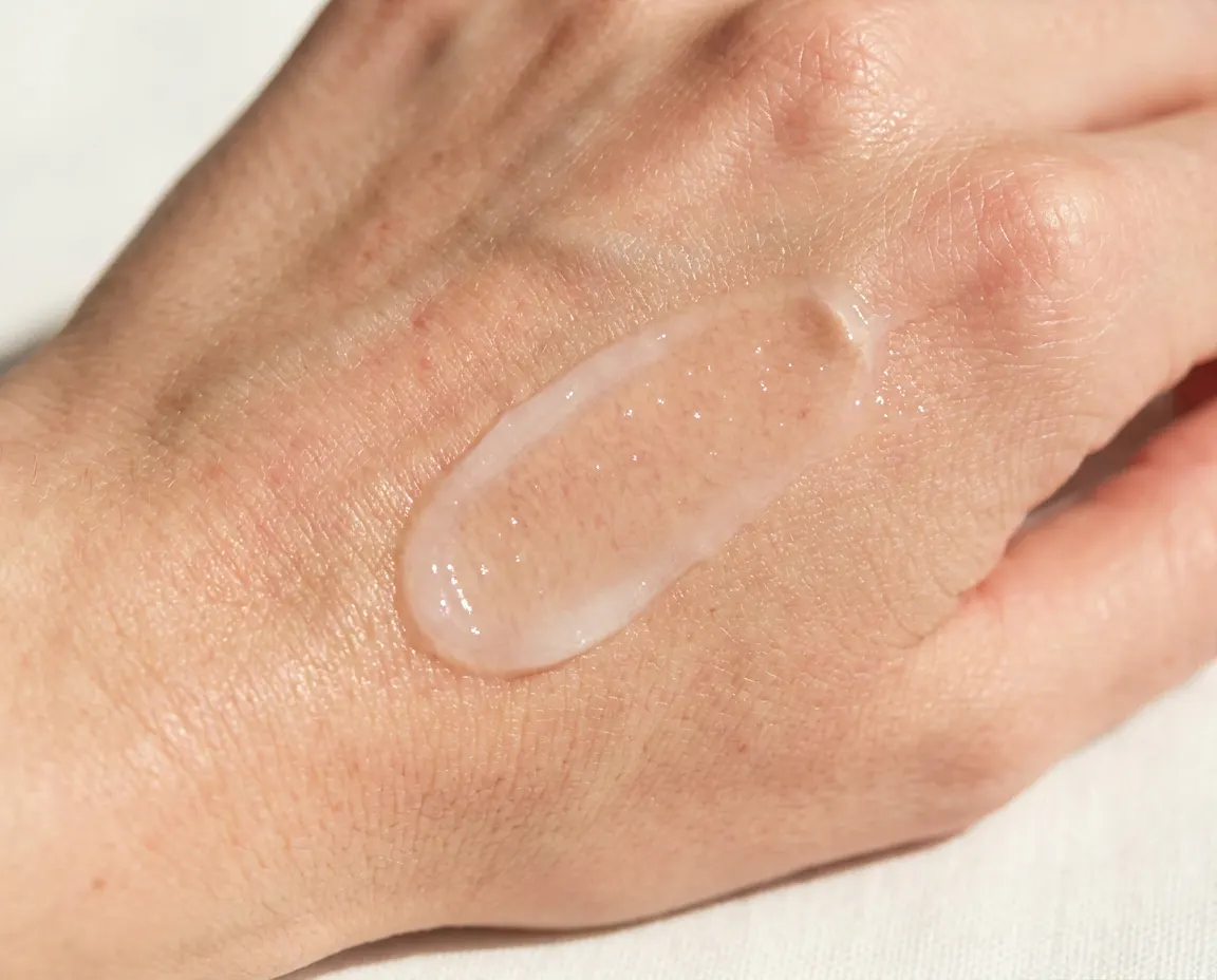 Translucent gel-cream texture with water-drop highlights
