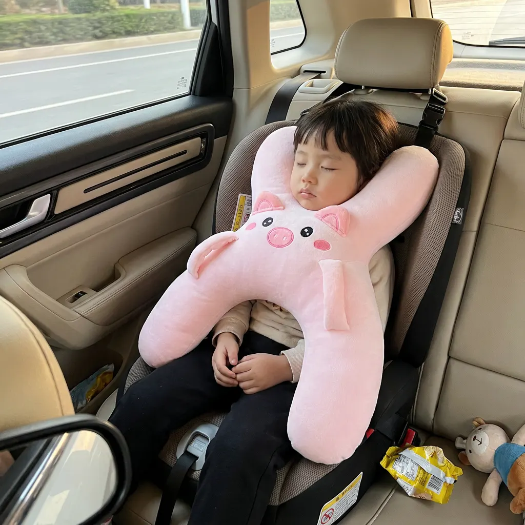 Child asleep in a car seat wearing the SnoozeBuddy pillow, chin cradled, head upright