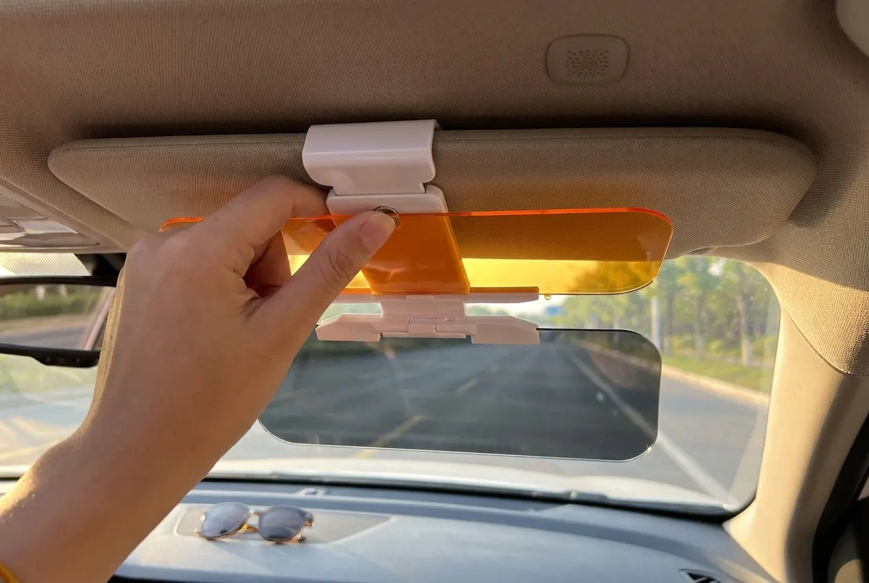 One adjustable clip. Virtually any visor.