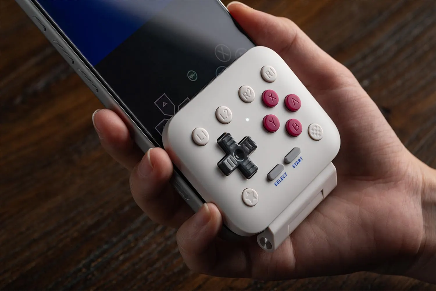 Control panel flipping down on the hinge so the buttons rest below the screen