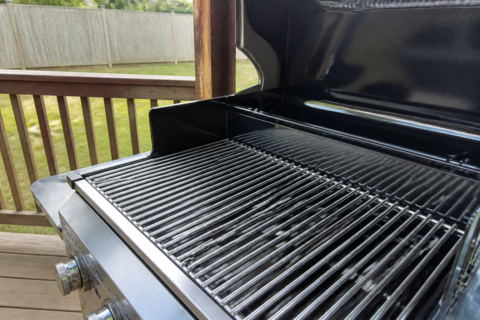 Same grill grate cleaned to bare shining metal after the electric brush