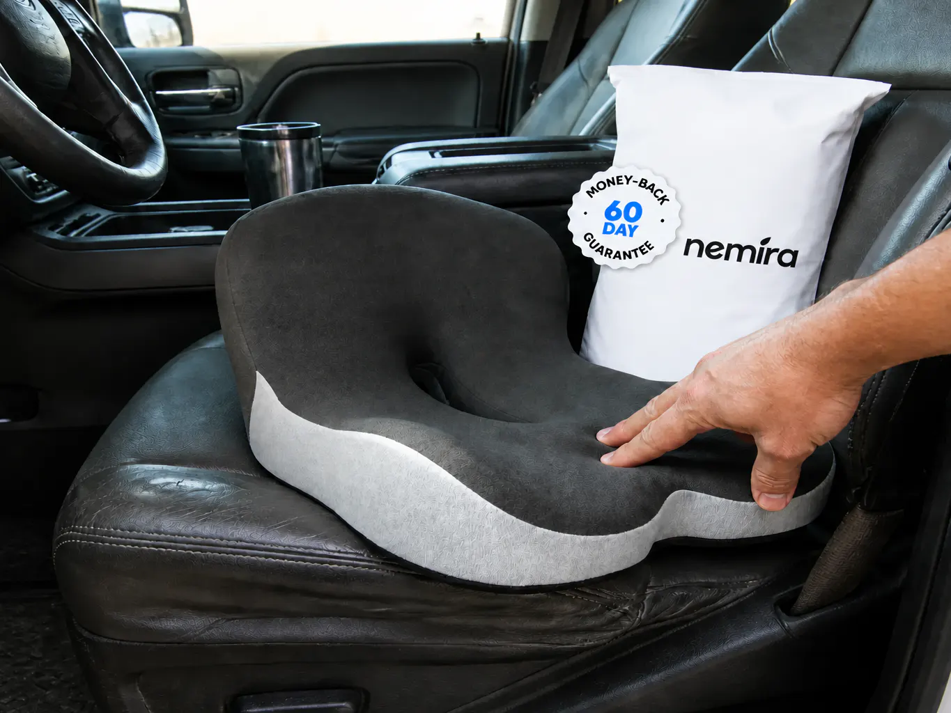 A hand pressing into the foam and the surface rebounding