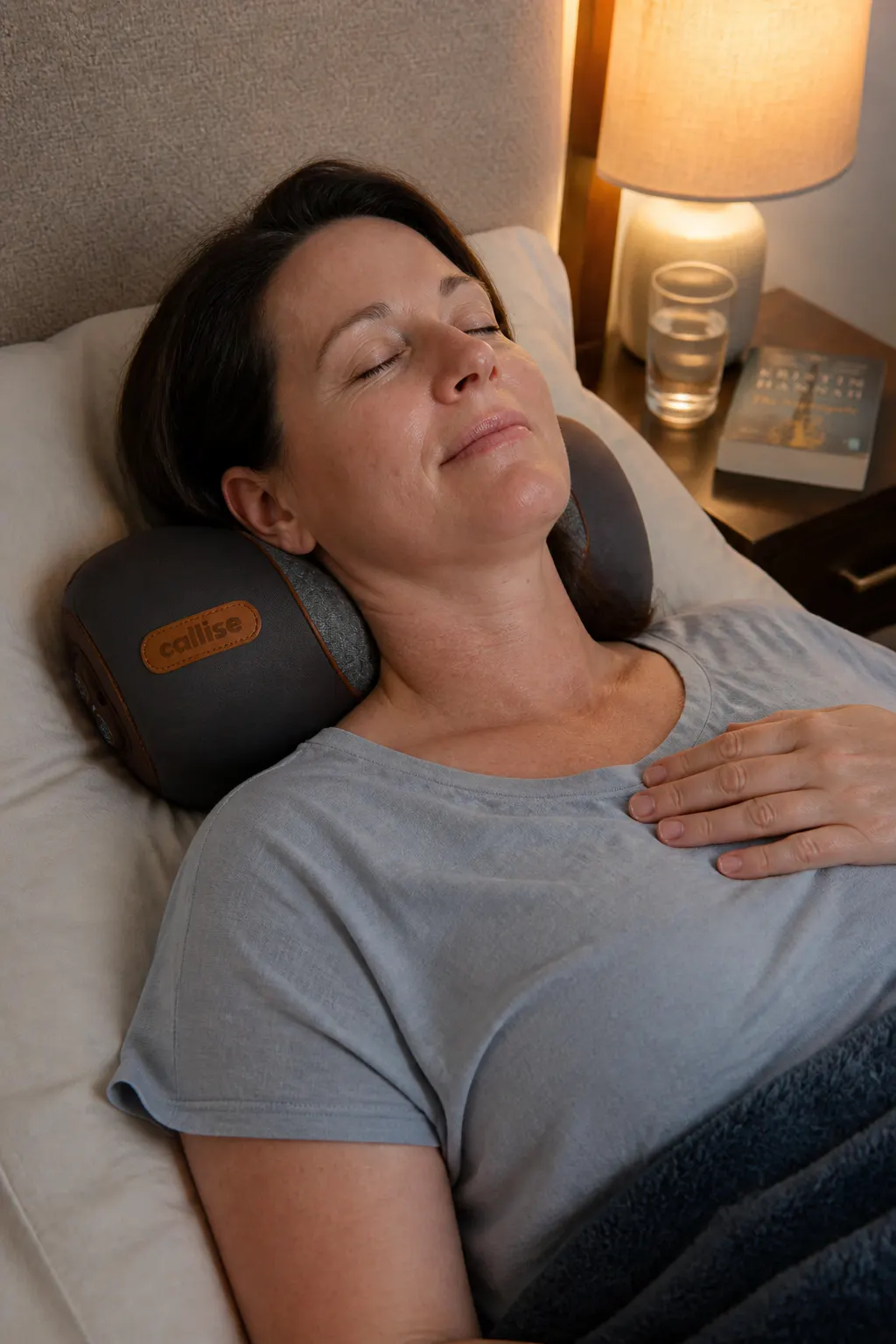 Person relaxing with the neck therapy device