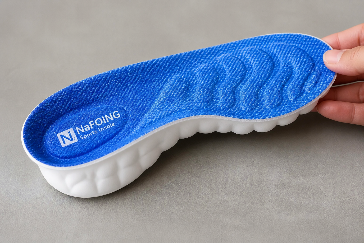 Side angle showing the U-shaped heel cup and raised arch